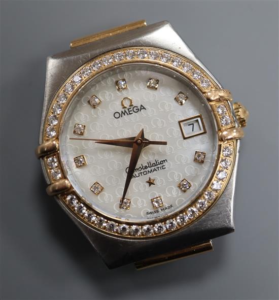 A ladys steel and gold Omega Constellation automatic wrist watch with diamond set bezel and numerals (a.f.)